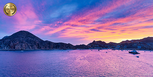 Cabo Vibes sunset coastal scenery over calm ocean — Salty Vibes